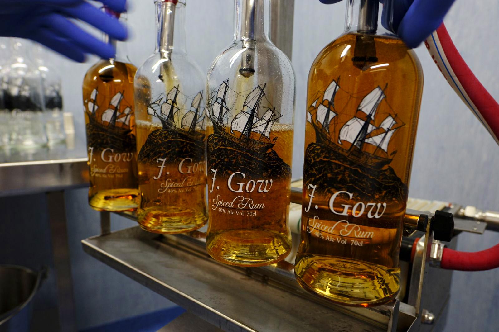 j gow spiced rum being filled
